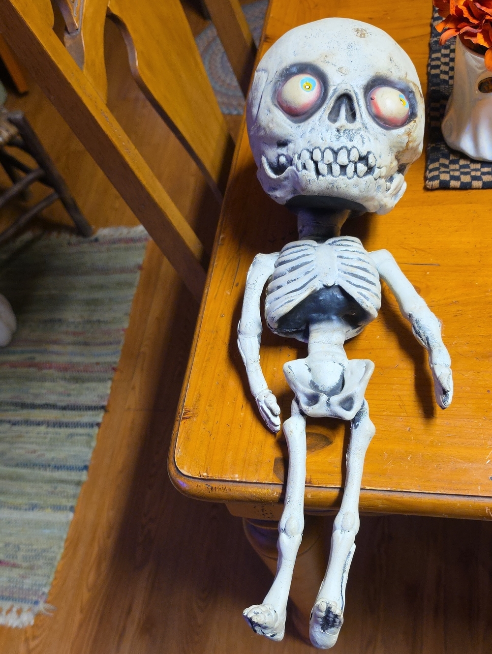 Vintage Decorative Halloween Skeleton Figurine with Colorful Eyes